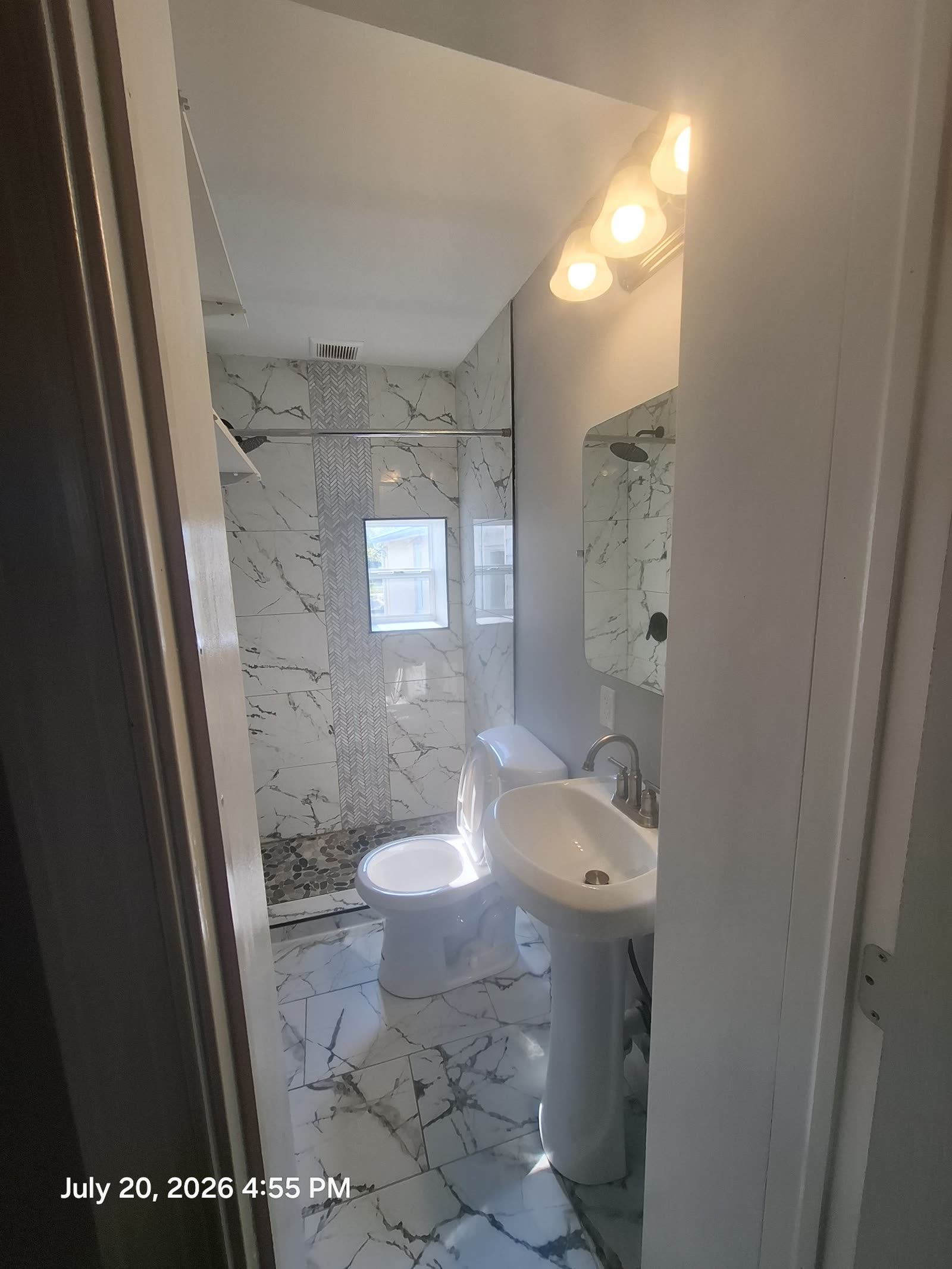 Bathroom with marble shower