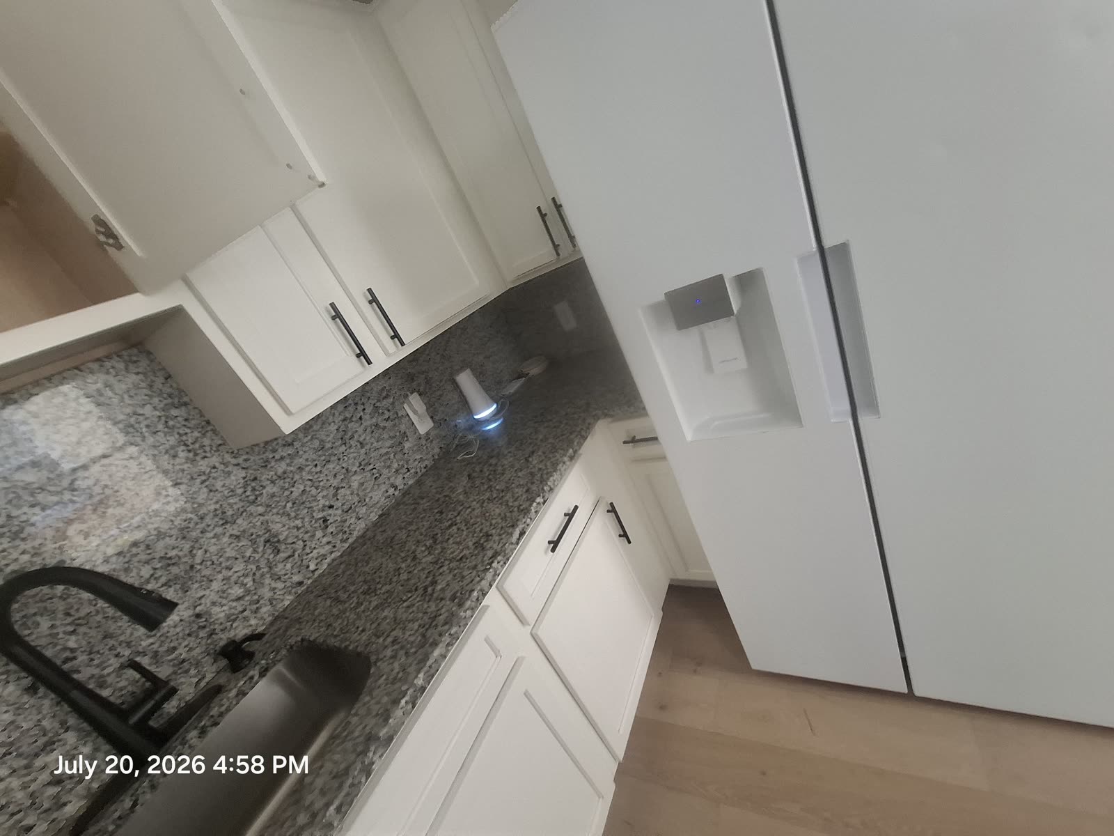 Kitchen sink and refrigerator